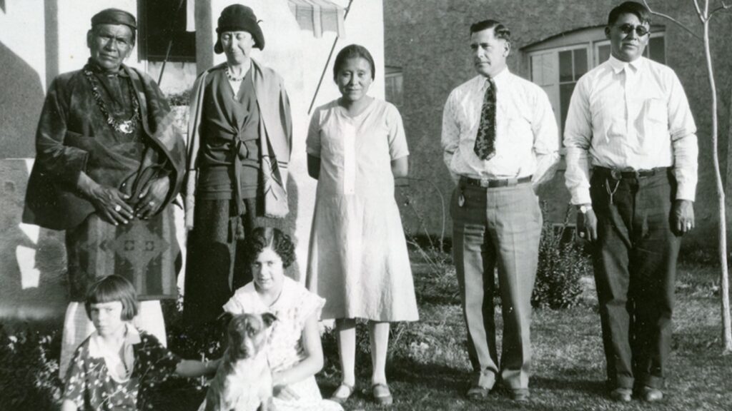 Recording Diné Traditions
Standing left to right: Hastiin Klah, Mary Cabot Wheelwright, Lucy Alfonso (Klah’s grand-niece); Arthur Newcomb, and Beyal Begay (interpreter). Seated: the Newcombs’ daughters Priscilla and Lynette. Phoenix, 1928. 
